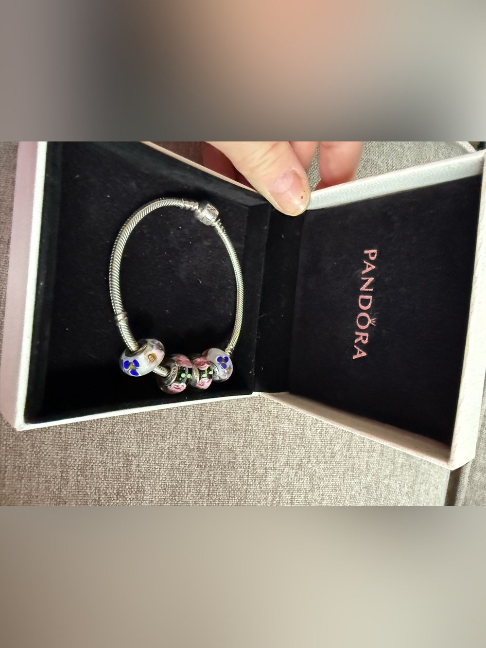 pandora bracelet with four glass murano beads